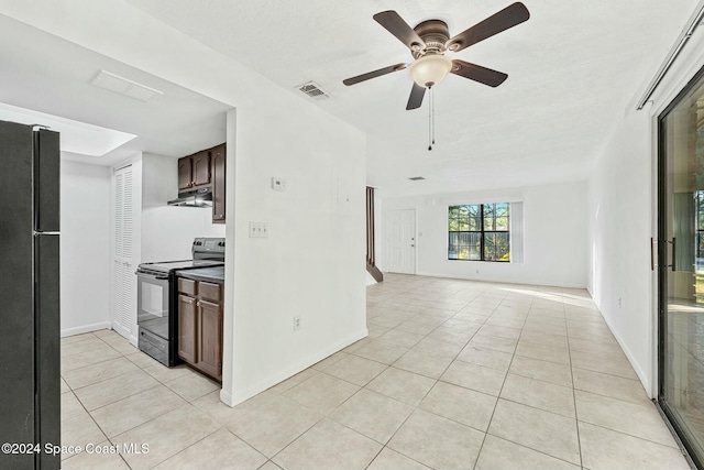 kitchen with ceiling fan, dark brown cabinets, light tile patterned floors, and black appliances