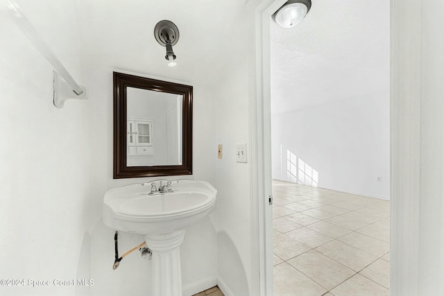 bathroom with tile patterned flooring