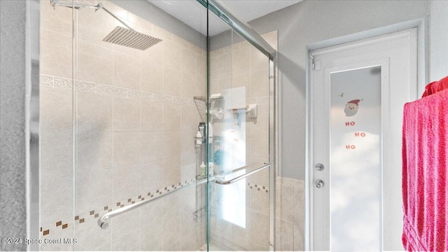 bathroom with an enclosed shower