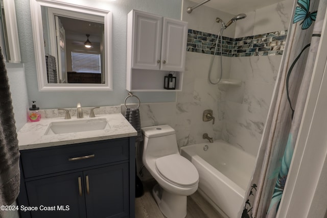 full bathroom with toilet, vanity, hardwood / wood-style flooring, and shower / tub combo with curtain