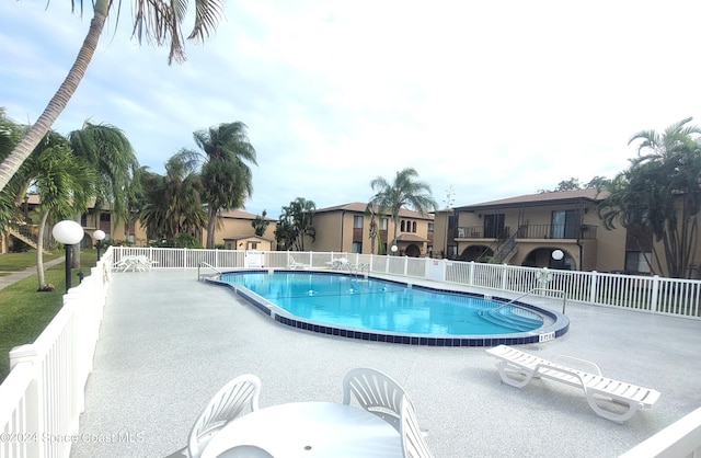 144 San Paulo Cir Unit 10-144, West Melbourne, FL 32904 - community pool with a patio