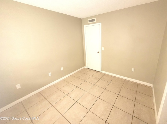 view of tiled spare room