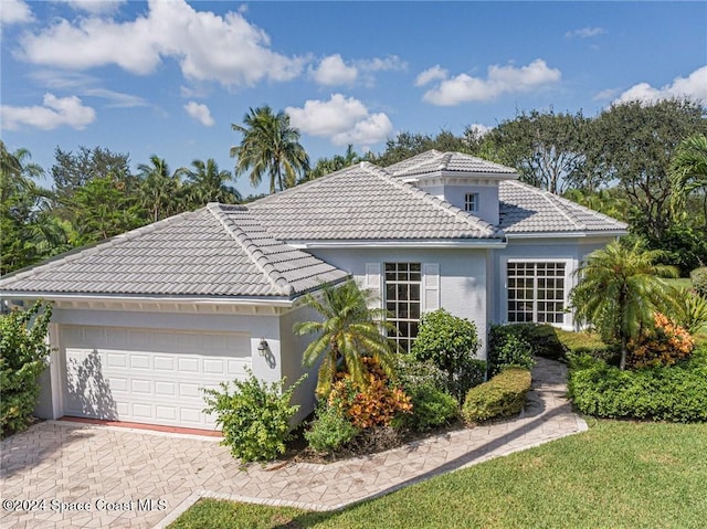 view of front of house with a garage