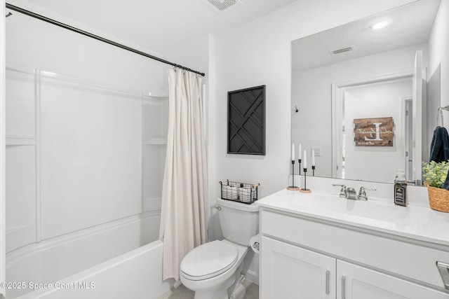 full bathroom featuring shower / bath combination with curtain, toilet, and vanity