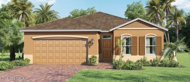 view of front of house featuring a front yard and a garage