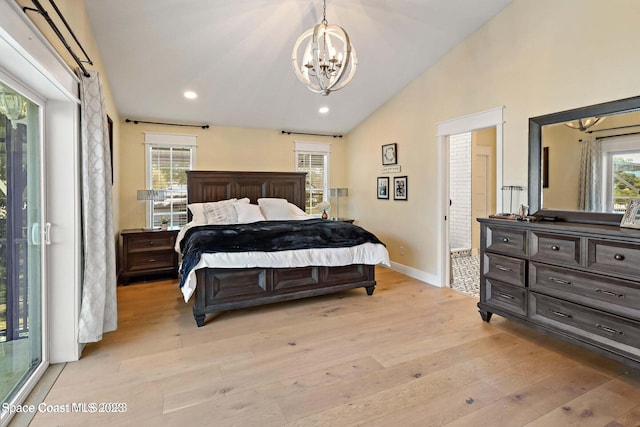 bedroom with access to outside, a chandelier, high vaulted ceiling, and light hardwood / wood-style floors