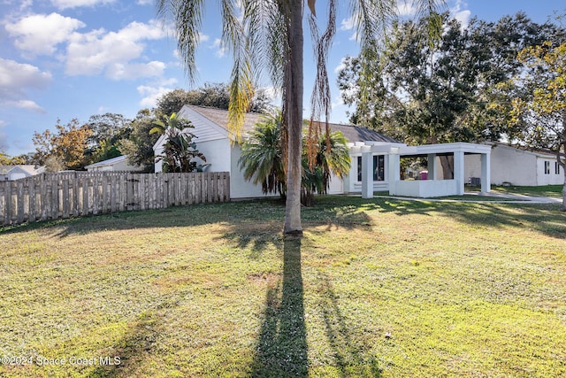 exterior space with a front lawn