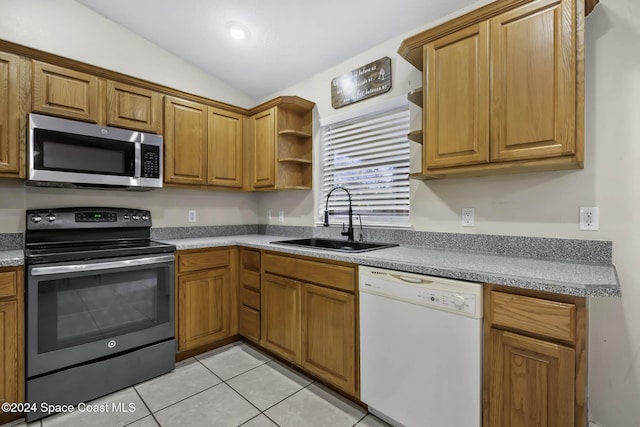 2773 San Filippo Dr SE, Palm Bay, FL 32909 - kitchen with stainless steel microwave, white dishwasher, range with electric cooktop, open shelves, and lofted ceiling