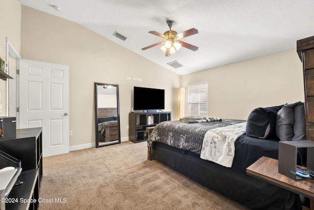 bedroom featuring ceiling fan, light colored carpet, and lofted ceiling