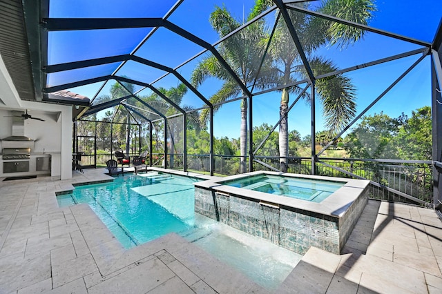 view of swimming pool with an in ground hot tub, glass enclosure, area for grilling, and a patio area