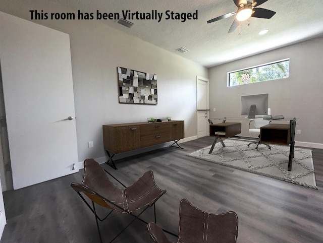 office featuring a textured ceiling, dark hardwood / wood-style floors, and ceiling fan