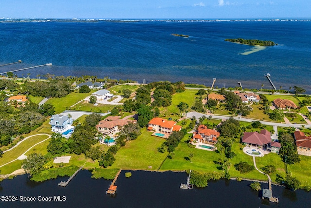 birds eye view of property featuring a water view