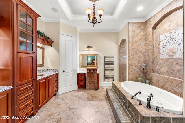 bathroom with vanity, crown molding, a textured ceiling, a notable chandelier, and tiled bath