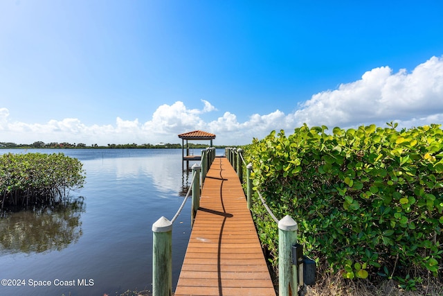 view of dock with a water view