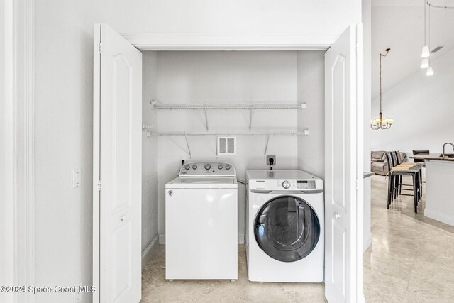 laundry area with separate washer and dryer