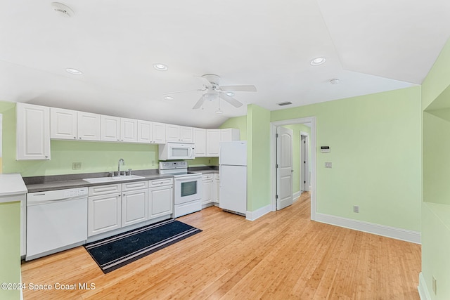 kitchen with white appliances, sink, light hardwood / wood-style flooring, ceiling fan, and white cabinetry