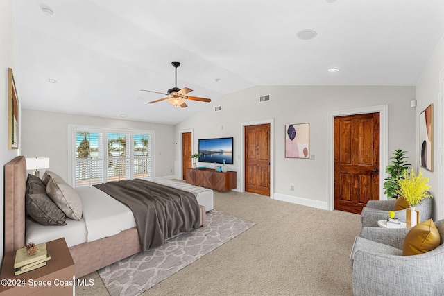 carpeted bedroom featuring ceiling fan and lofted ceiling