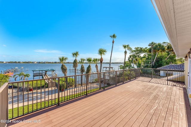 deck featuring a water view