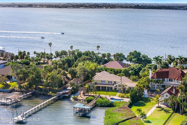 drone / aerial view with a water view