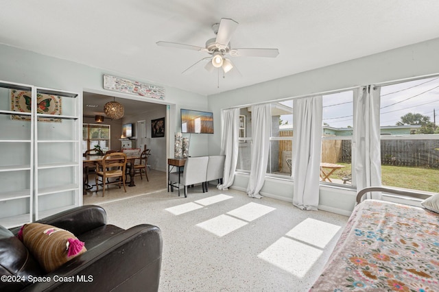 living room featuring ceiling fan