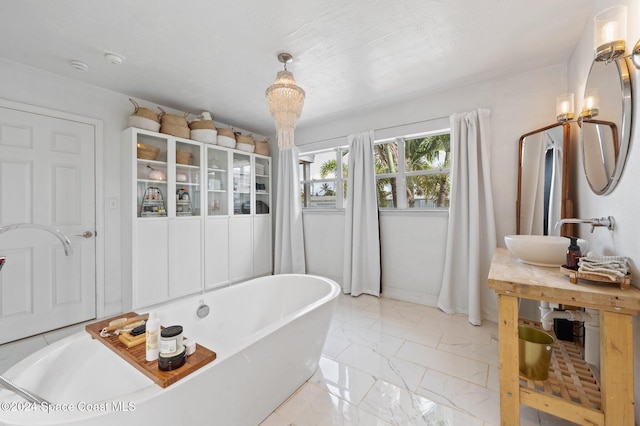 bathroom with a bathing tub and sink