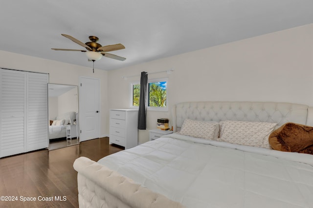 bedroom featuring dark hardwood / wood-style flooring and ceiling fan