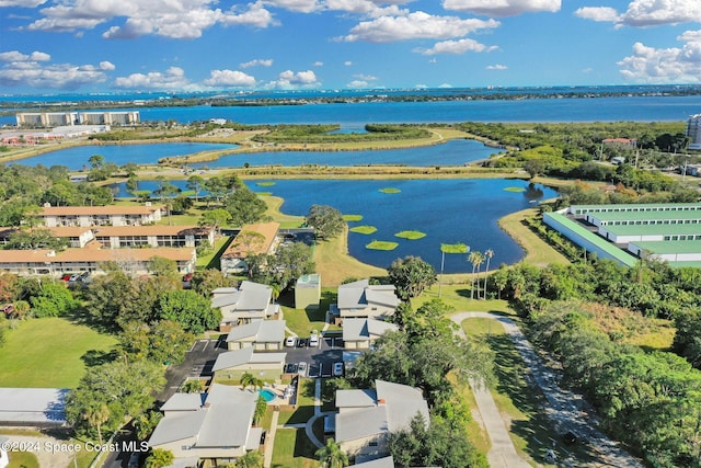 drone / aerial view featuring a water view