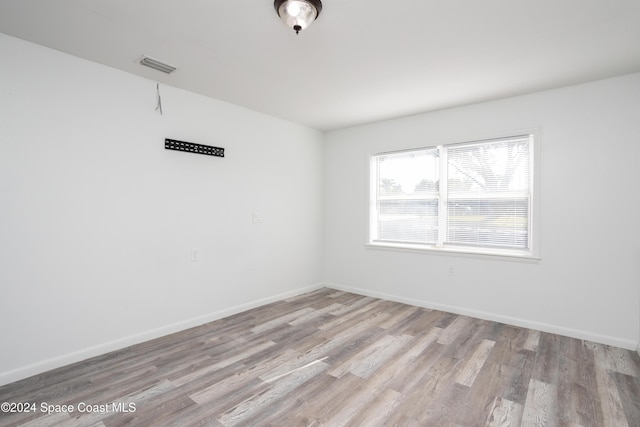 empty room featuring light hardwood / wood-style floors