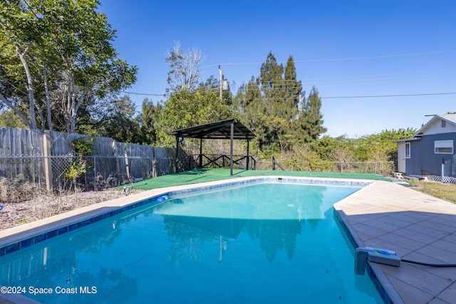 view of swimming pool with a gazebo