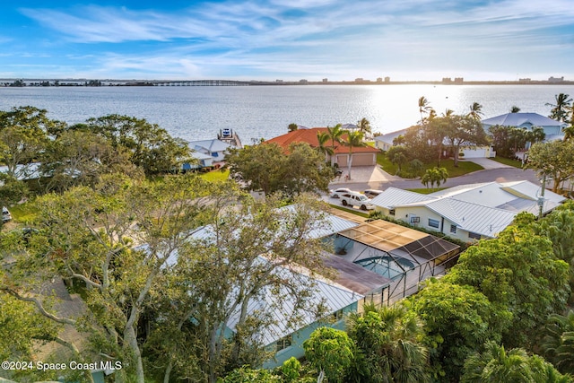 birds eye view of property featuring a water view