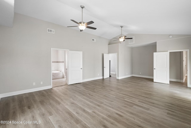 interior space featuring wood-type flooring, high vaulted ceiling, and ceiling fan