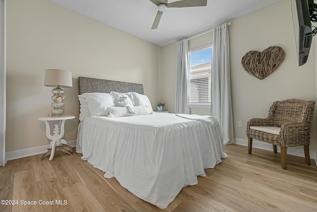 bedroom featuring ceiling fan and light wood-type flooring