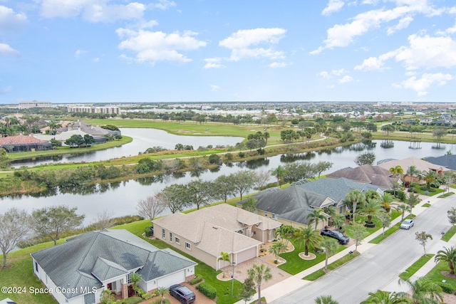 drone / aerial view featuring a water view