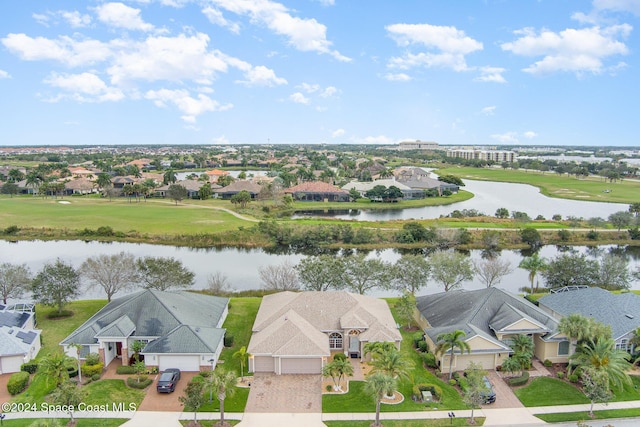 bird's eye view with a water view