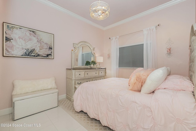 tiled bedroom featuring an inviting chandelier and ornamental molding