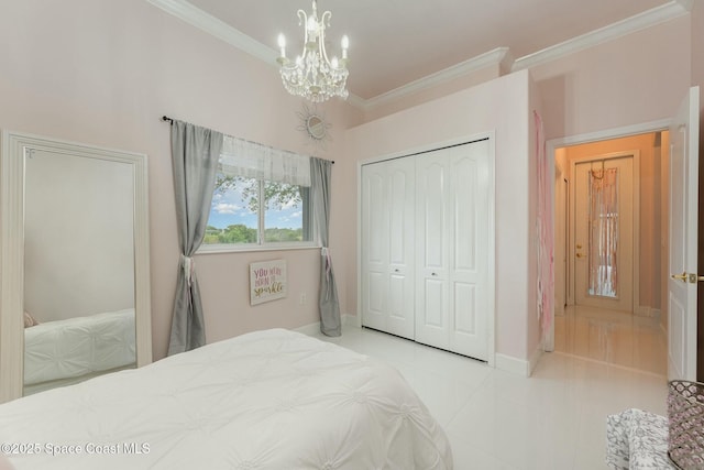 tiled bedroom featuring a closet, crown molding, and a notable chandelier