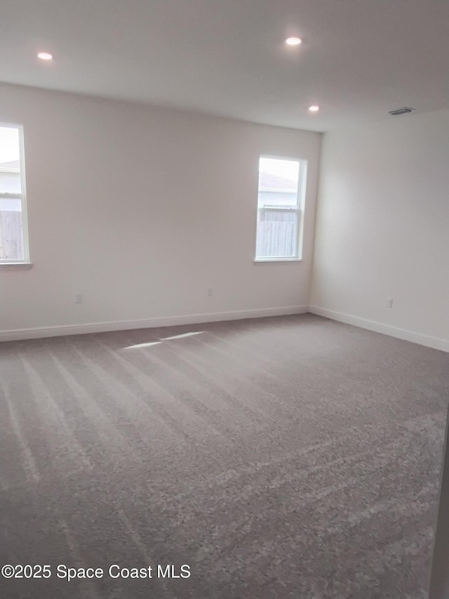 view of carpeted spare room