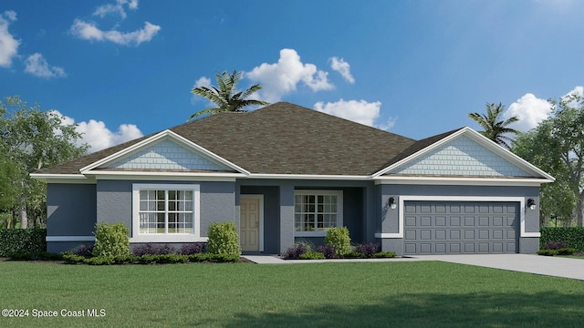 view of front of property with a front lawn and a garage