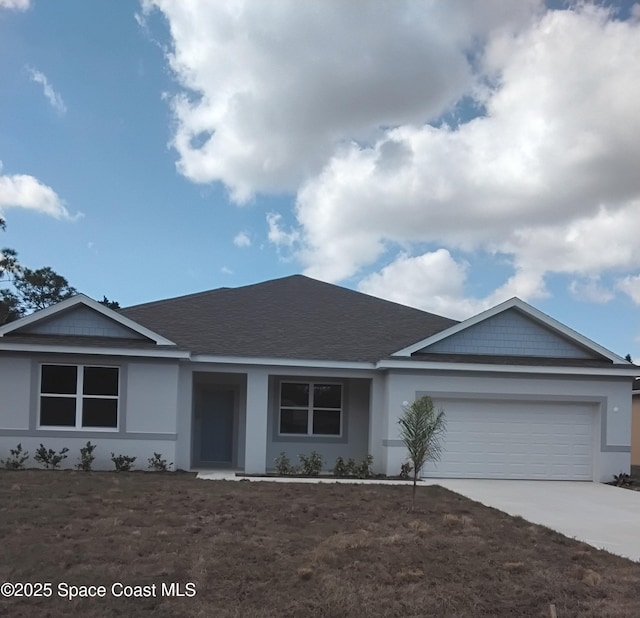 single story home with a garage