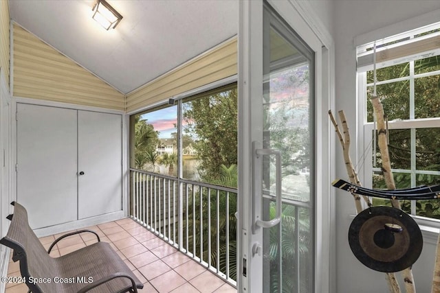 sunroom / solarium with lofted ceiling