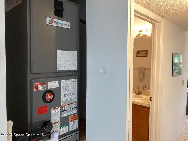 utilities featuring heating unit and sink