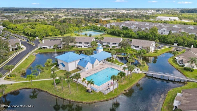 bird's eye view with a water view