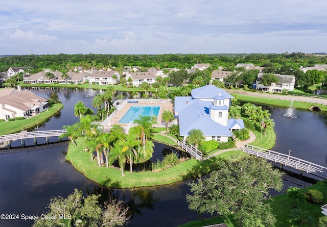 bird's eye view with a water view