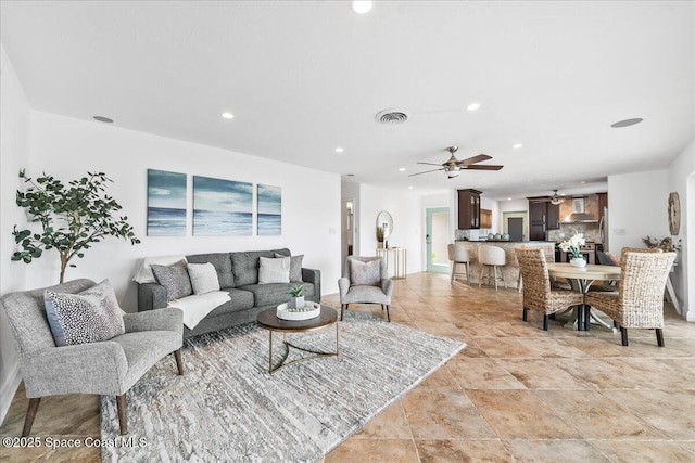 living room featuring ceiling fan