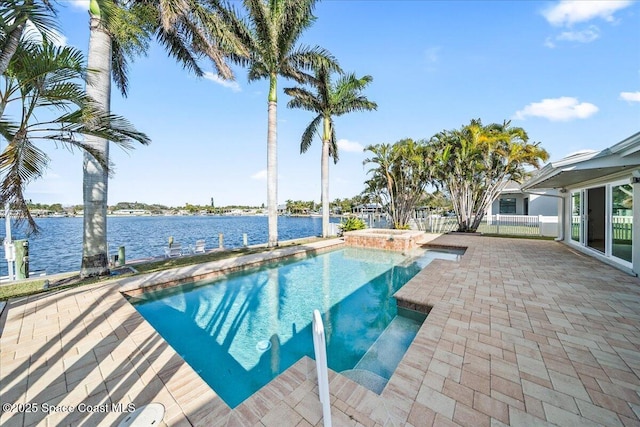 view of swimming pool with a water view, an in ground hot tub, and a patio