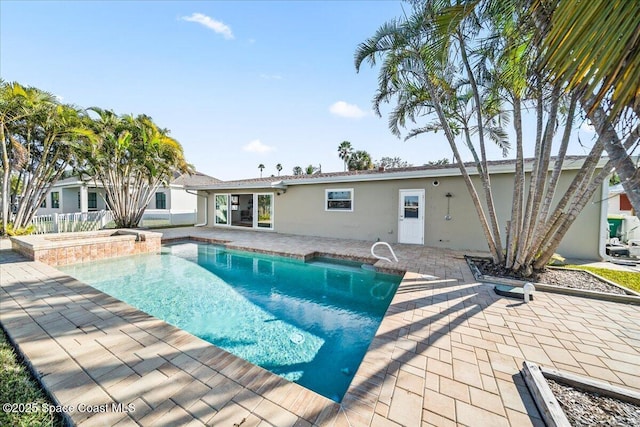 view of pool featuring a patio