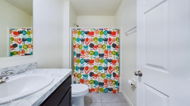 bathroom featuring tile patterned floors, walk in shower, vanity, and toilet