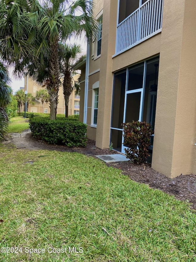 exterior space with a lawn