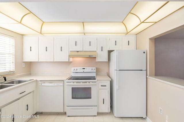 kitchen with sink, white cabinets, and white appliances