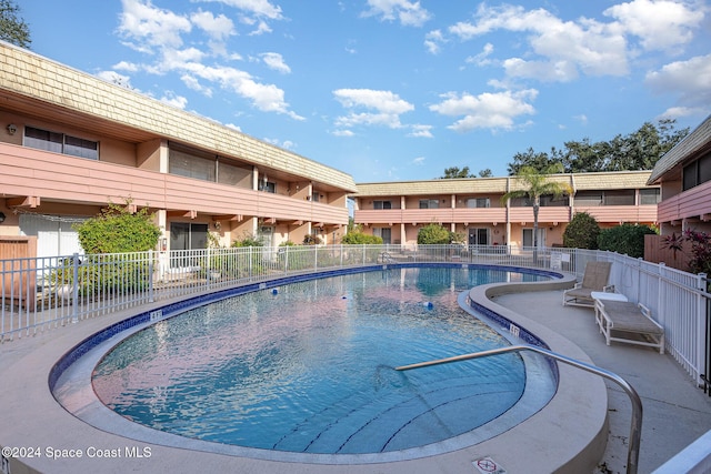 view of pool featuring a patio